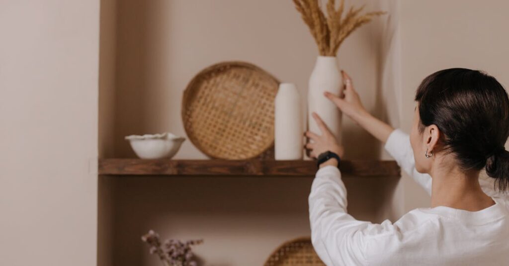 pexels photo 7408634 7408634 1 A woman arranging vases on a rustic shelf, highlighting minimalist interior design.